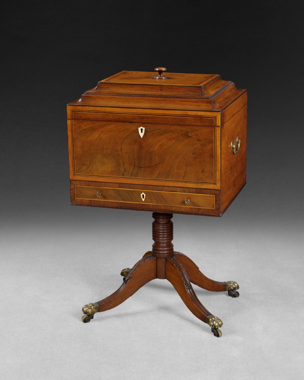 Regency Mahogany and Satinwood teapoy with brass carrying handles