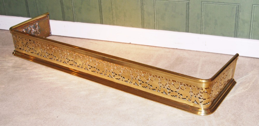 Mid 19th. century leaf pattern pierced brass fender