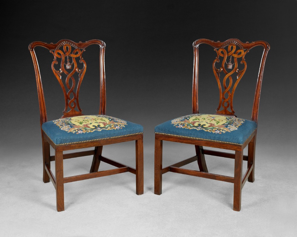 Pair of Chippendale period carved Mahogany side chairs