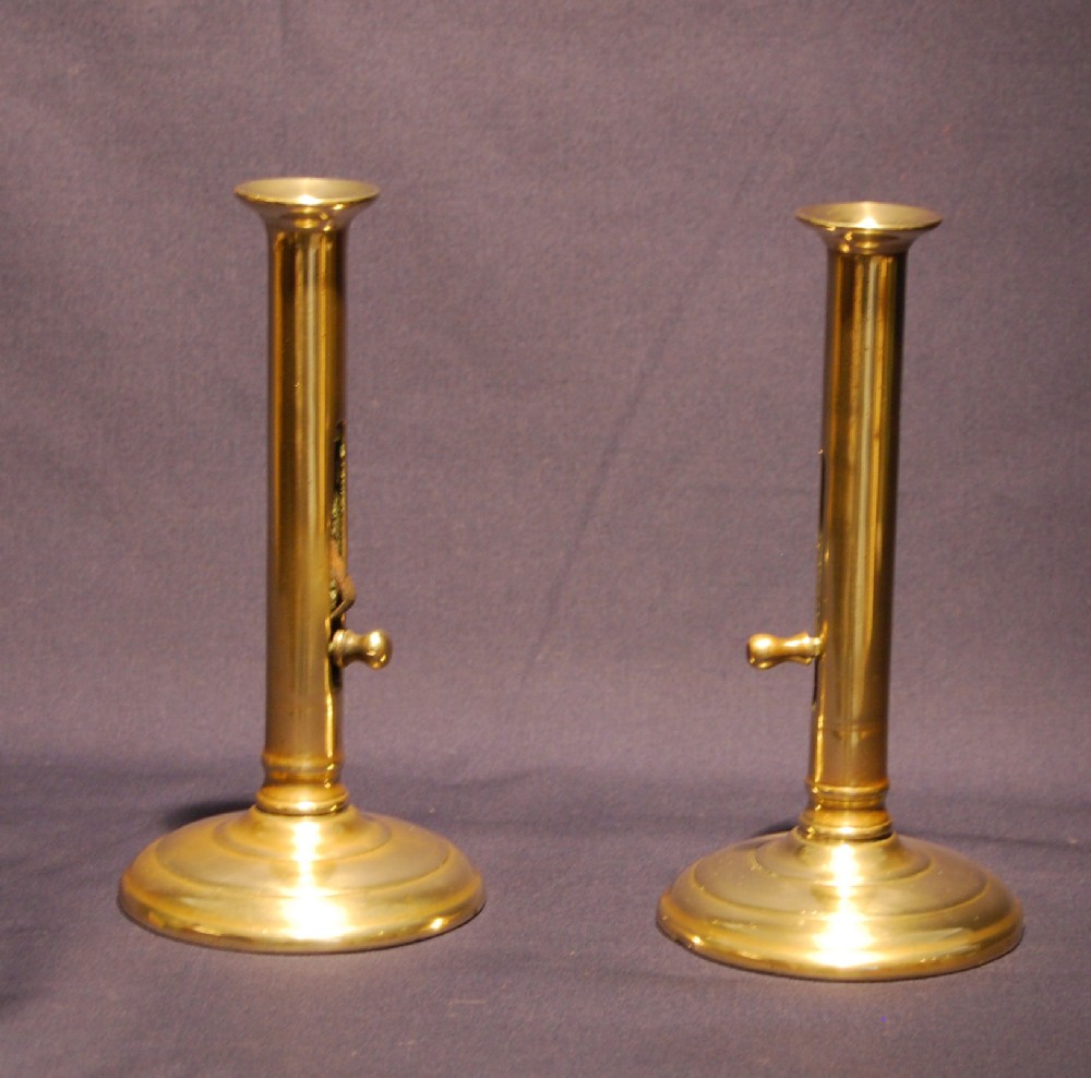 Pair of George II Side Ejector Brass Candlesticks 