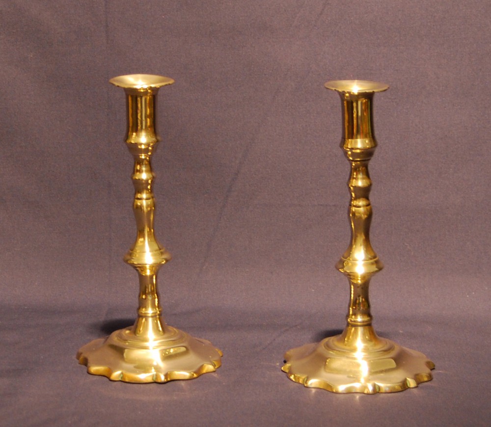 Pretty pair of George II Petal Based Brass Candlesticks