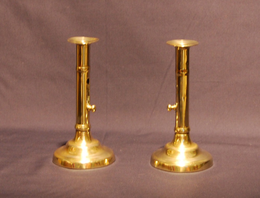 Pair of George III period Brass Ejector Candlesticks