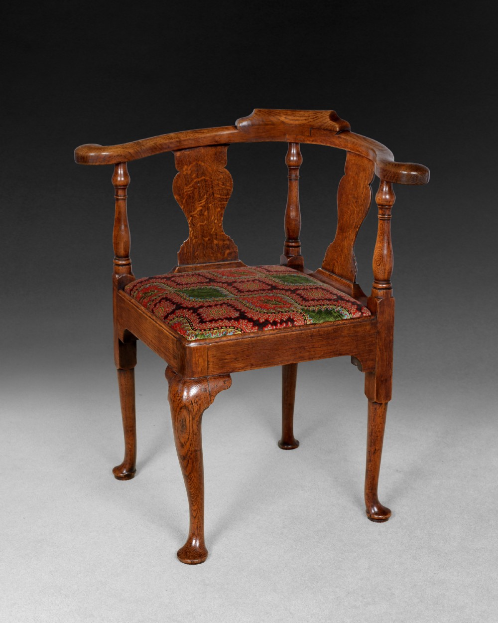 Mid 18th. century oak corner armchair