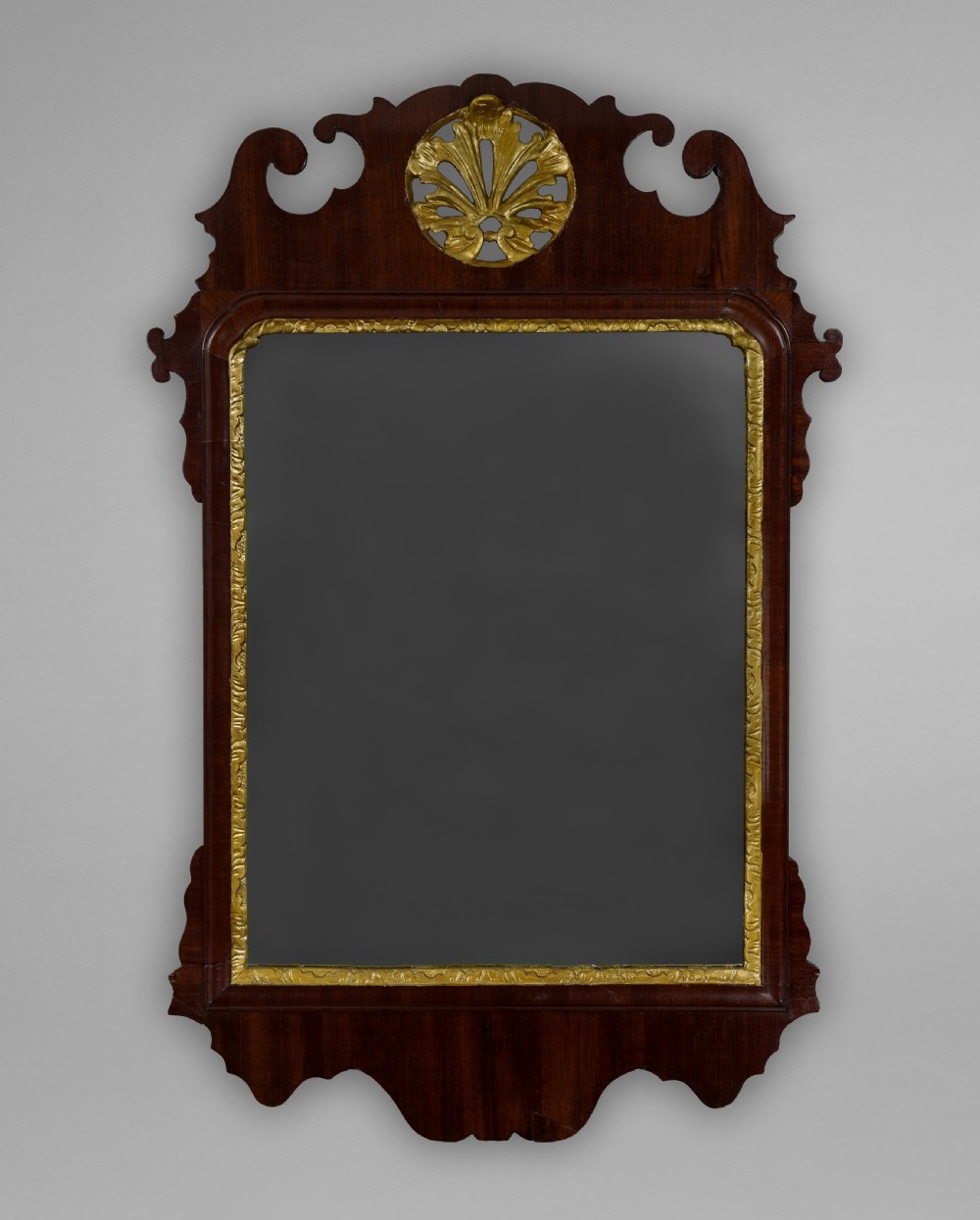 George III Period Mahogany and parcel gilt fretwork wall mirror 