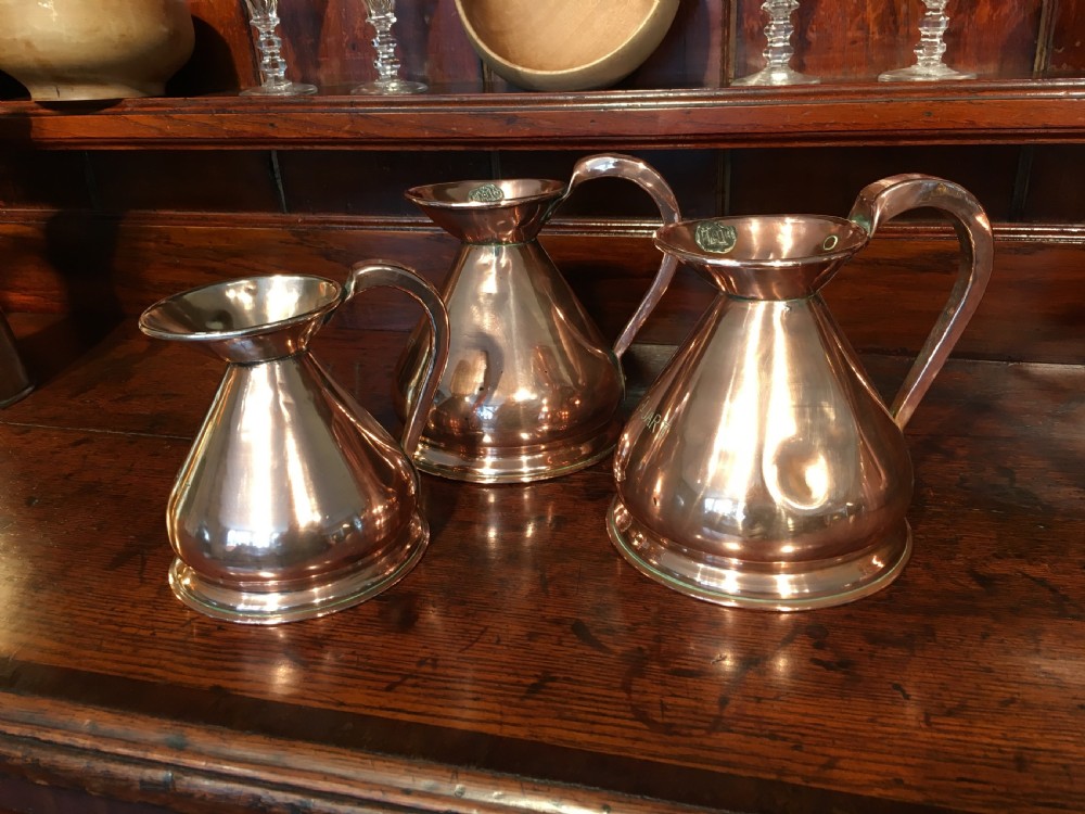 A collection of 3 Victorian copper measures