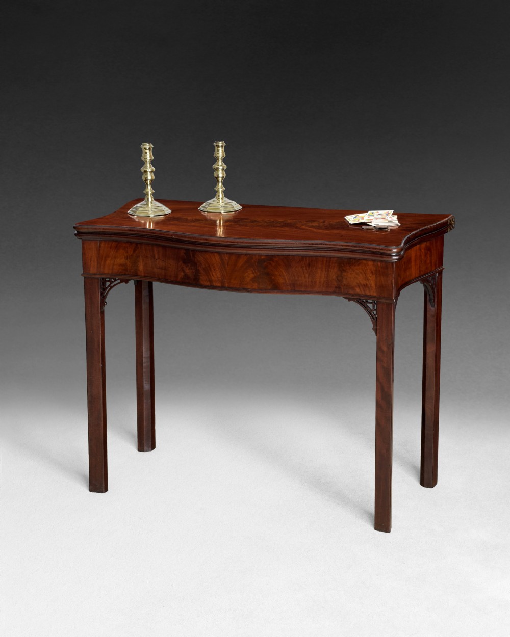 Chippendale period Serpentine shaped Mahogany Fold over top Card Table View III