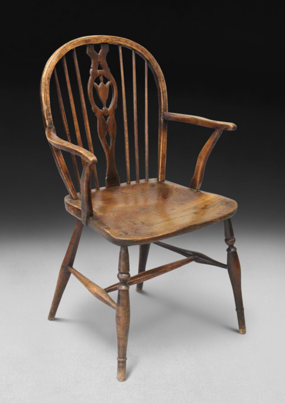 A George III period Ash and Elm Low Back Windsor armchair 