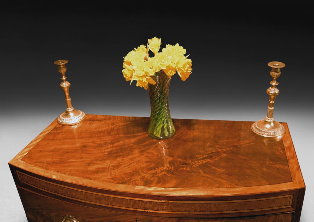 George III Period Mahogany .Caddy-topped Bow Fronted Chest of drawers View II