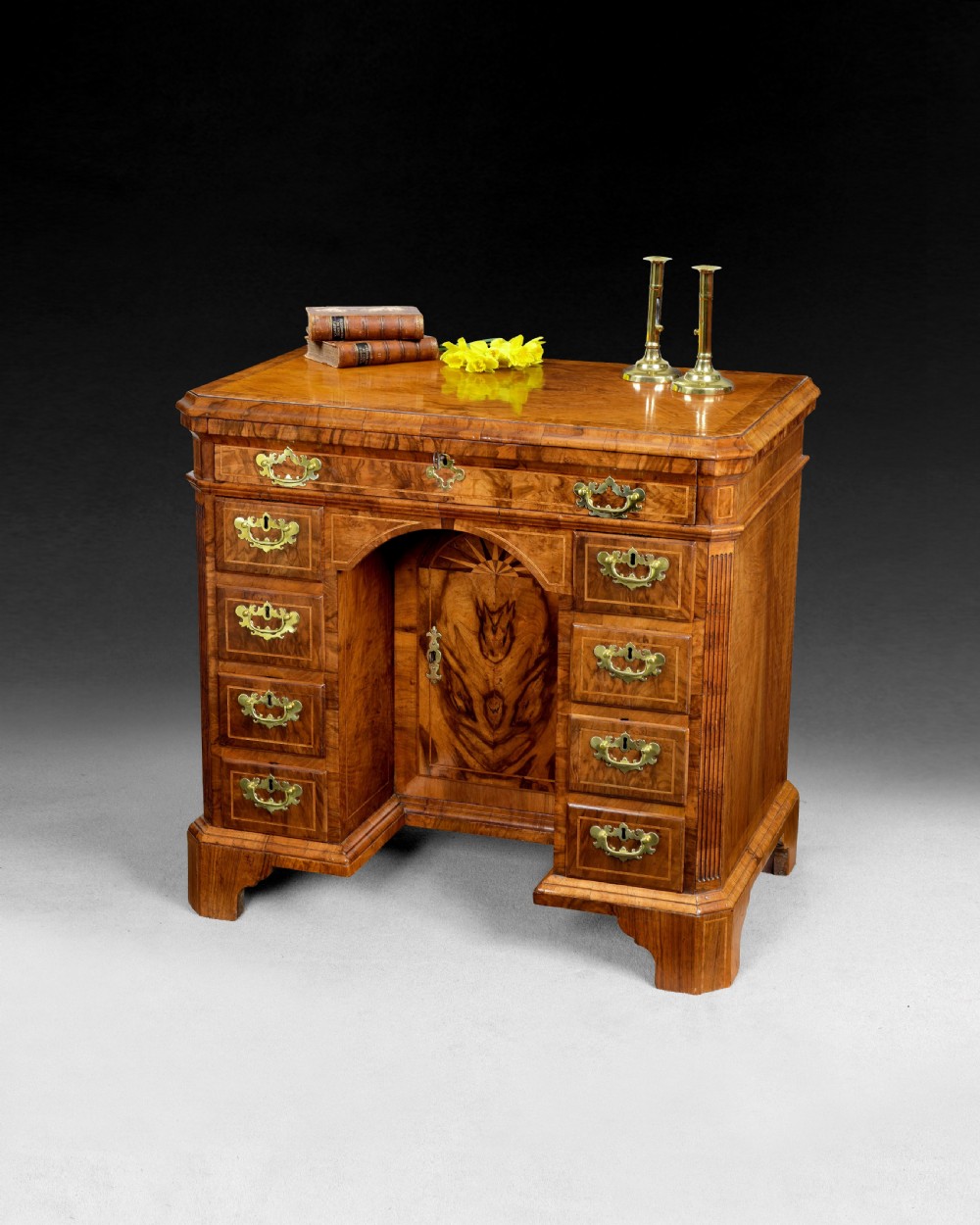 Queen Anne period walnut crossbanded and feather banded Kneehole Desk