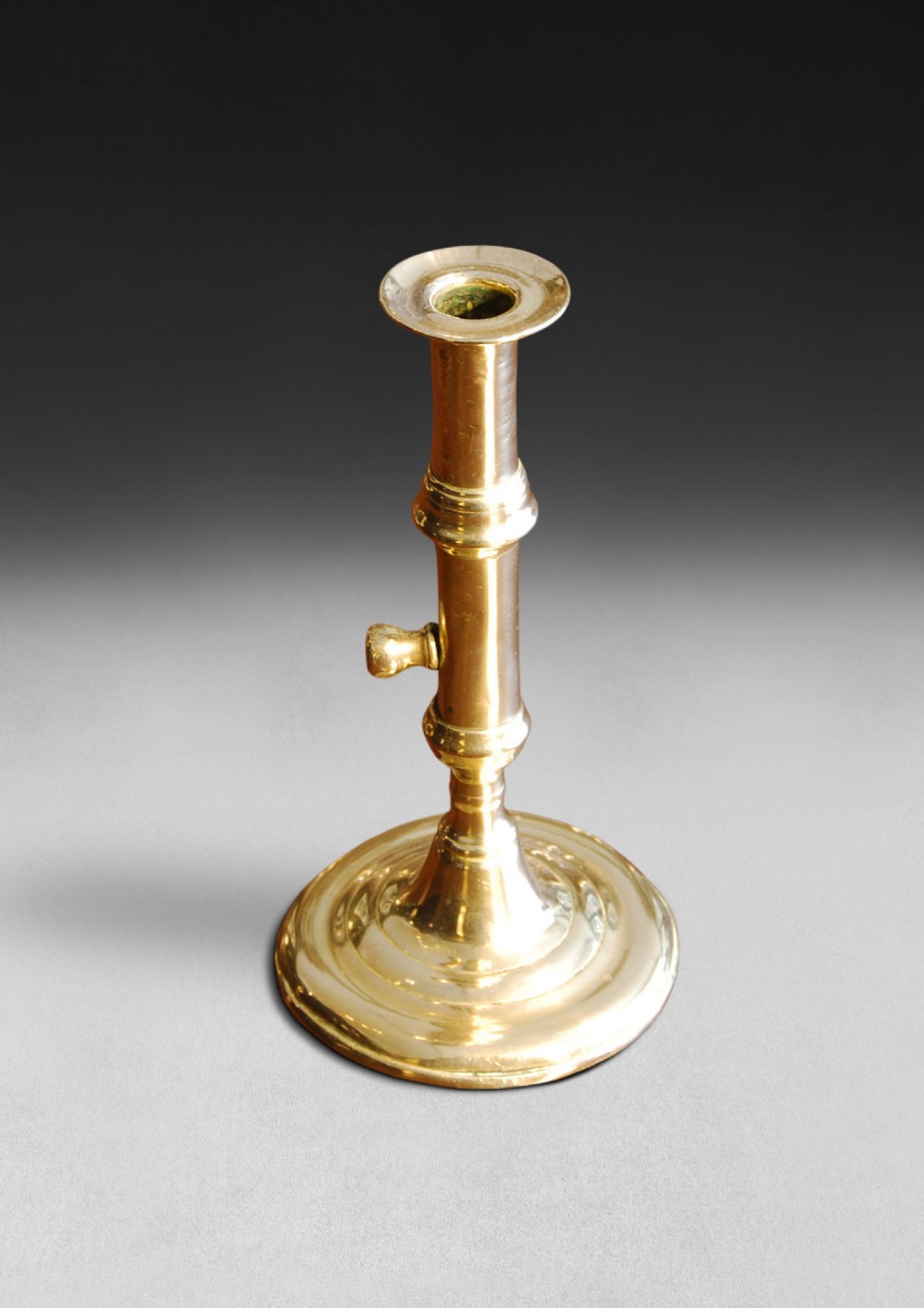 Early 18th. century Brass Taper Stick with a side ejector 