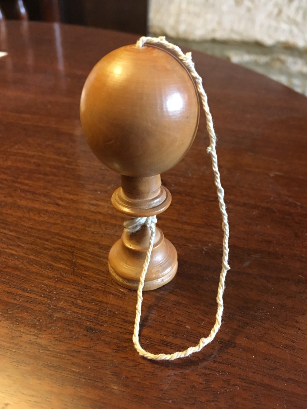 An early nineteenth century treen boxwood mini bilboquet, childs toy View II