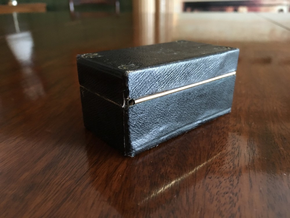 Rectangular black leather clad travelling inkwell with double wells View V