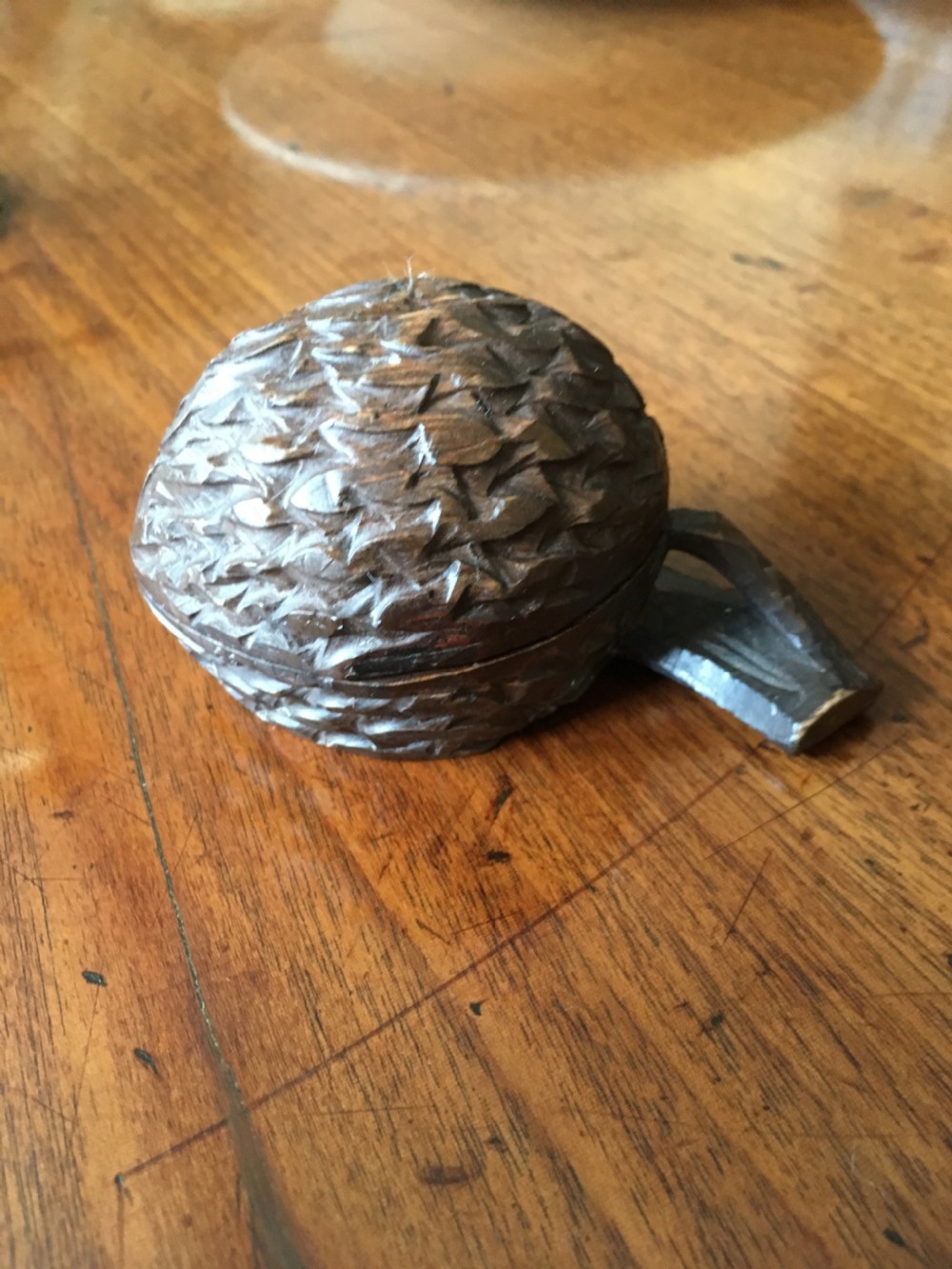 Large carved wooden inkwell in the shape of a walnut