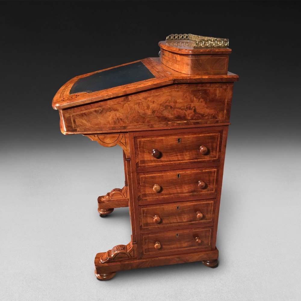 A Victorian inlaid Walnut and Crossbanded Davenport View II