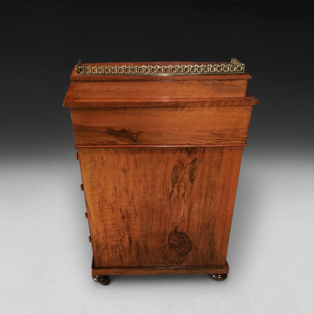 A Victorian inlaid Walnut and Crossbanded Davenport View V
