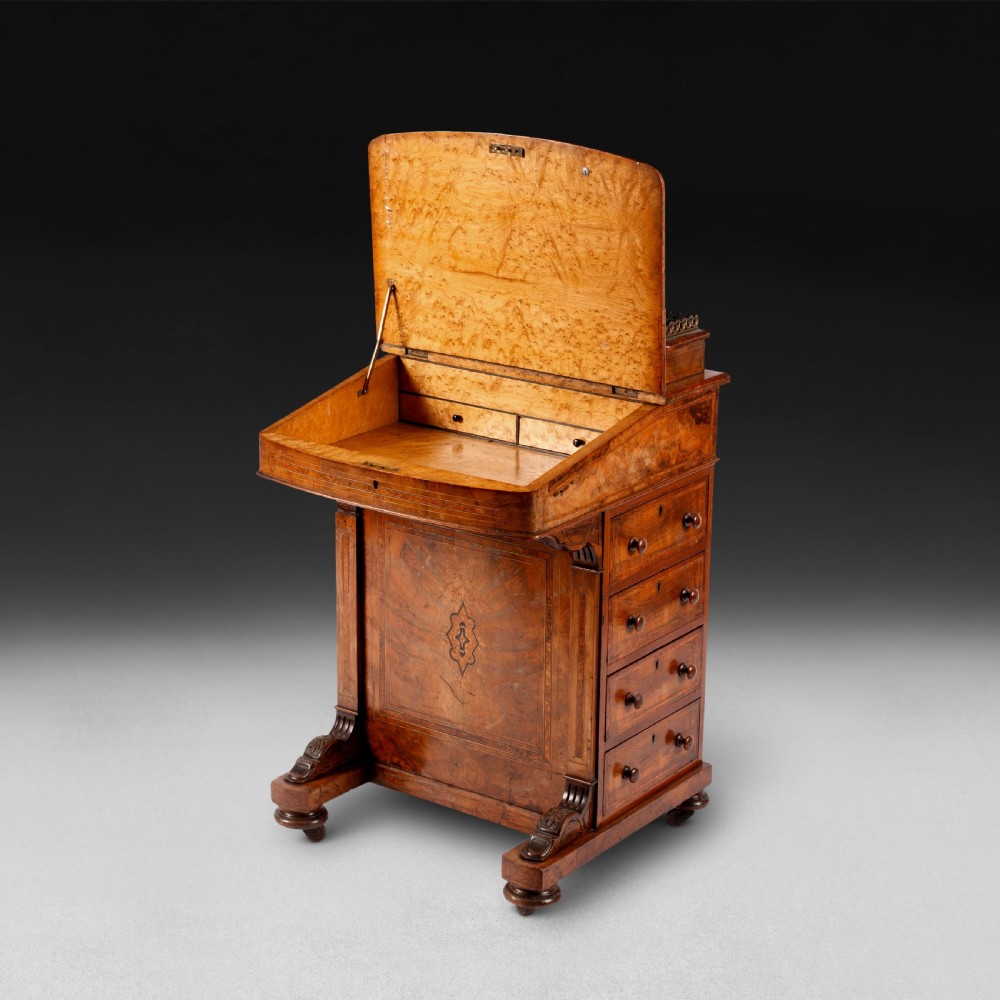 A Victorian inlaid Walnut and Crossbanded Davenport View XII