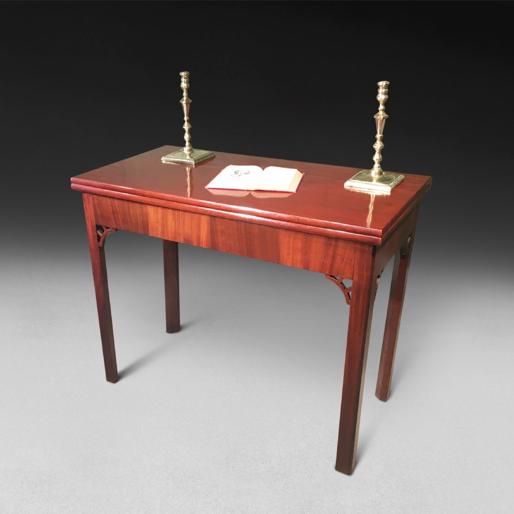 George III mahogany turnover top tea table, with concertina action