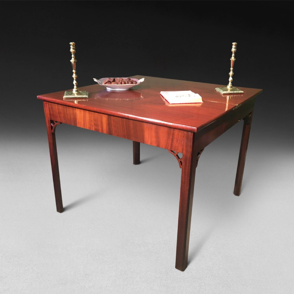 George III mahogany turnover top tea table, with concertina action View II