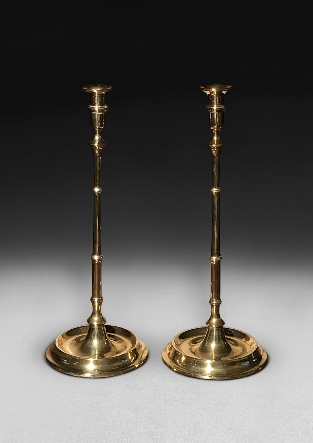 Pair of tall Mid 19th. Century Brass Candlesticks