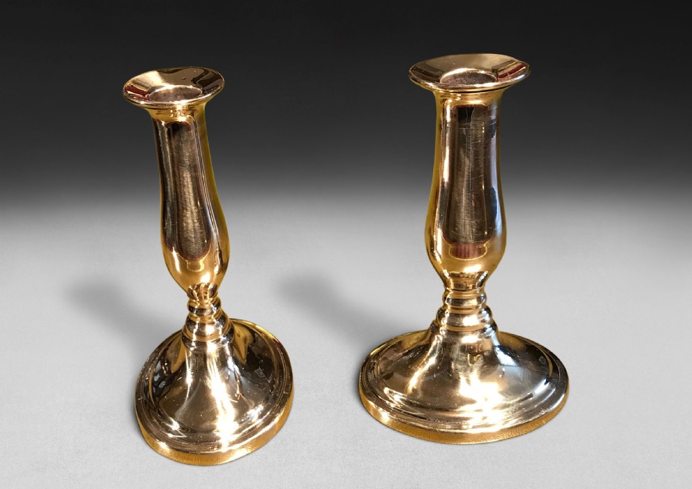 Pair of George III Gunmetal Ejector Candlesticks