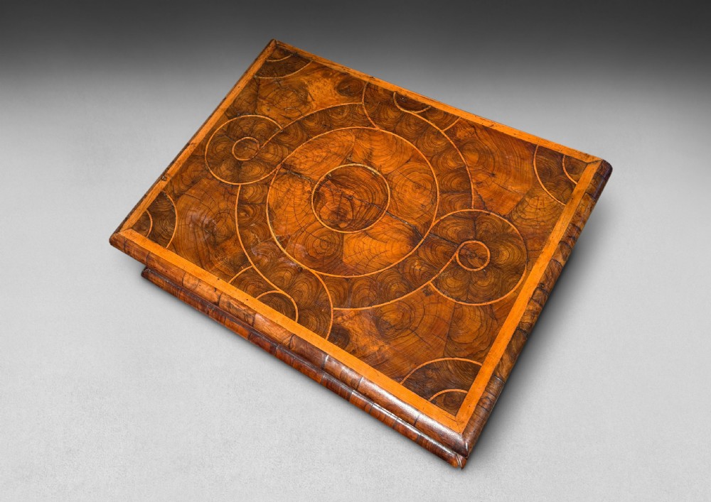 
A William & Mary walnut oyster-veneered lace box