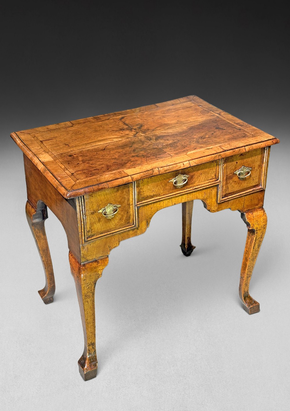 A Queen Anne Period Walnut Lowboy
