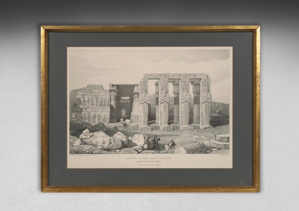 A set of eight 19th-century framed lithographs depicting ancient Egyptian temples, monuments, and landscapes, presented in gilt frames with dark grey mounts. View V