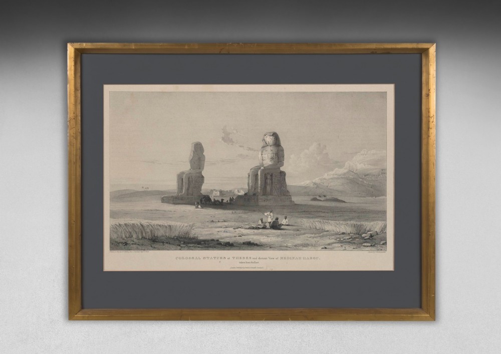 A set of eight 19th-century framed lithographs depicting ancient Egyptian temples, monuments, and landscapes, presented in gilt frames with dark grey mounts. View VI