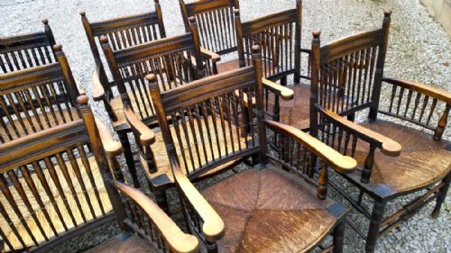 fig 1. A Very rare set of 12 arm chairs in Arts and Crafts Style