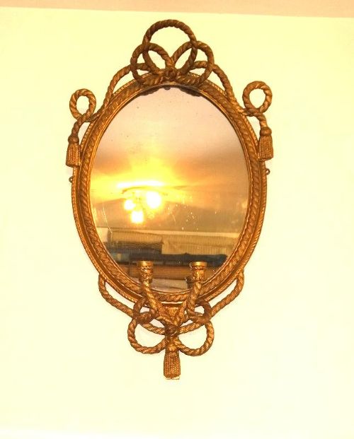 fig 1. Impressive Oval 19th Century Gilt wall mirror with candle sconce