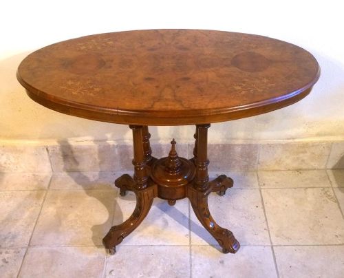 A Victorian Inlaid Pedestal Occasional Table with Burr Walnut Grain.