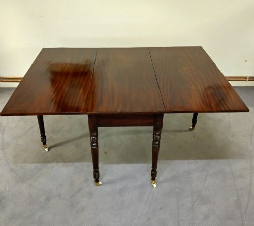 Georgian Mahogany Dining Table with Drop Leaves.