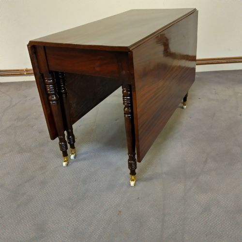 fig 1. Georgian Mahogany Dining Table with drop leaves.