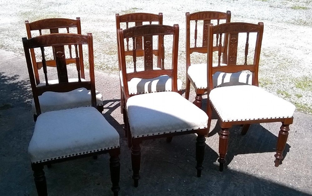 A quality set of six 19th Century walnut dining chairs