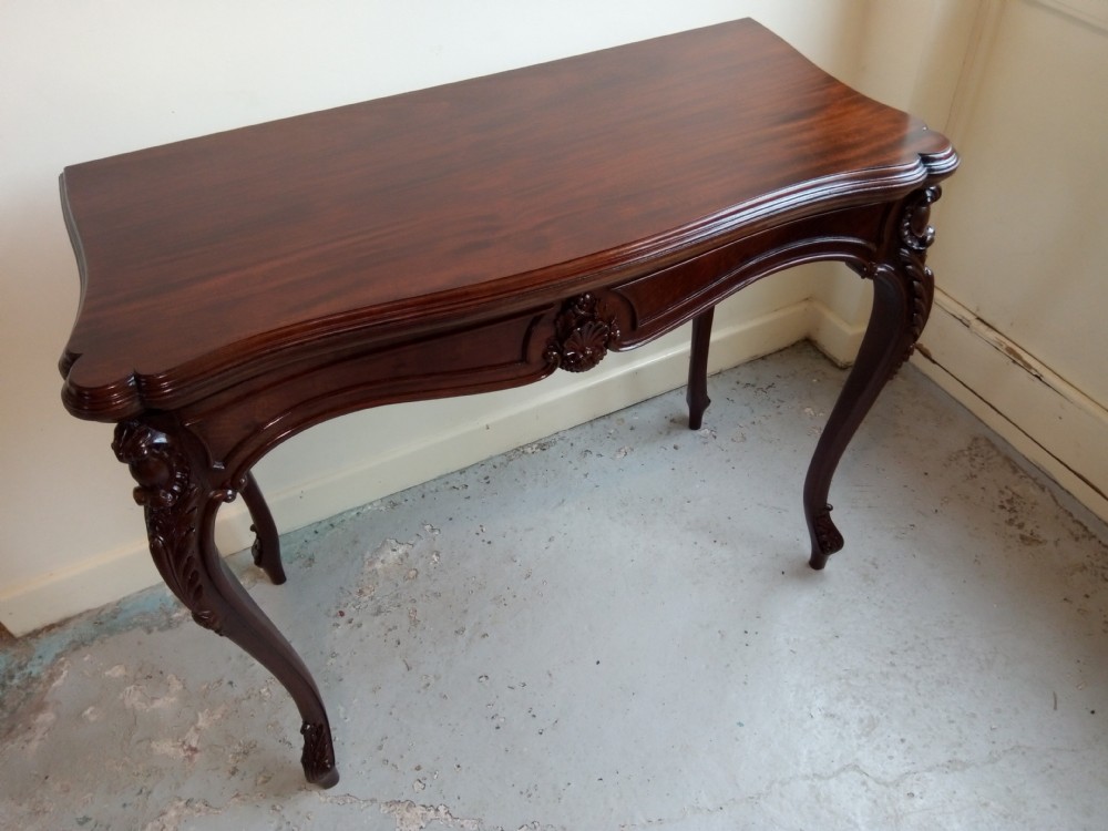 Mahogany fold over table on elegant cabriole leg View V