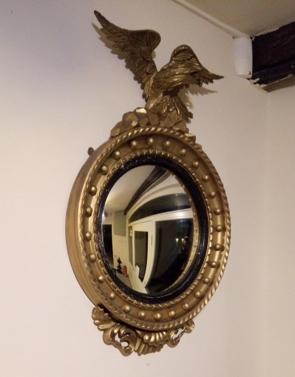 Convex circular Gilt mirror in classic Regency style.1908