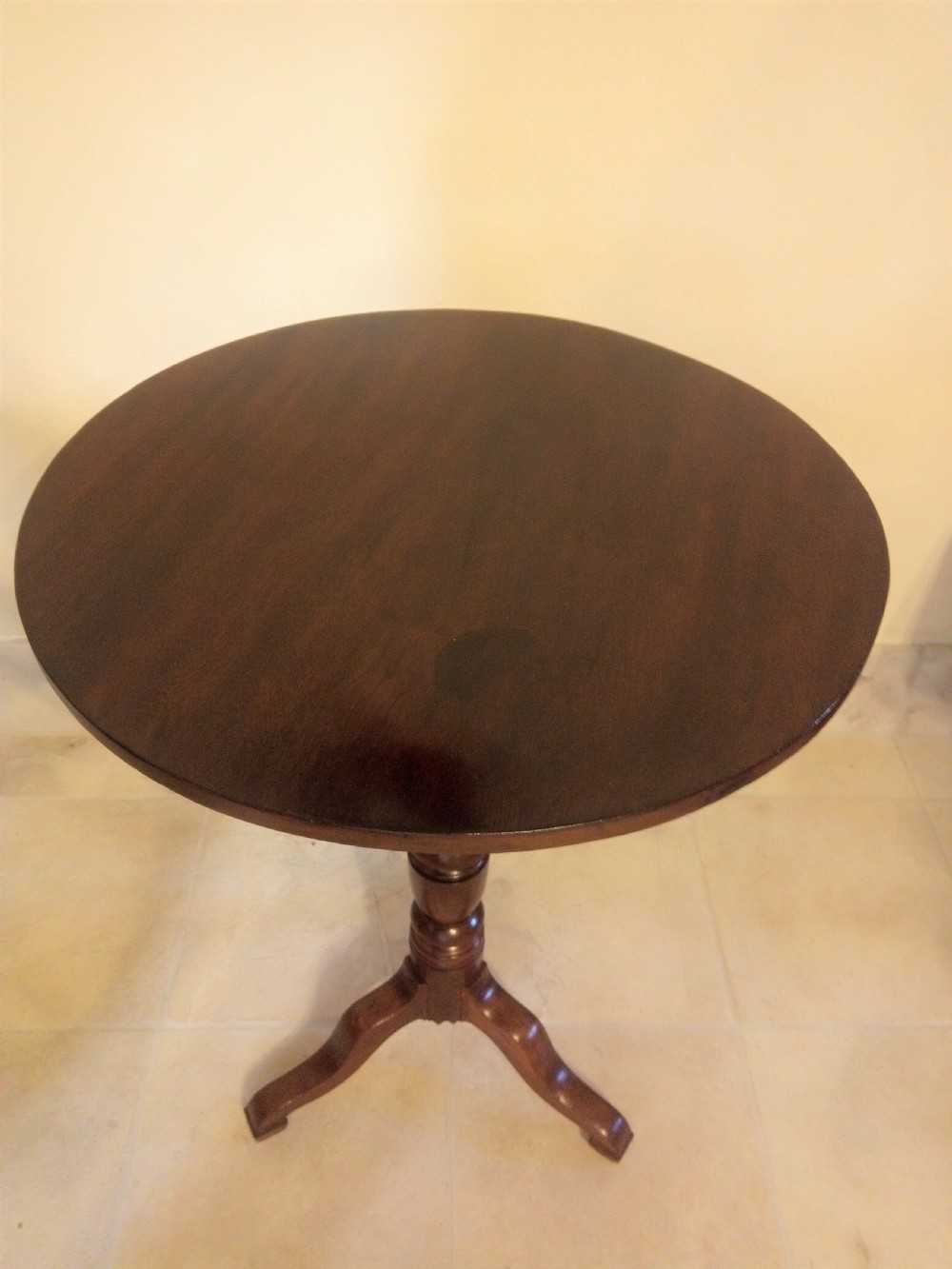 A neat little pedestal wine or lamp table in mahogany View II