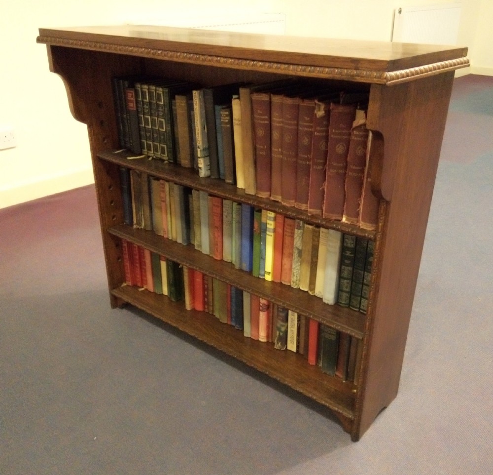 Very clean oak open fronted bookcase. View II