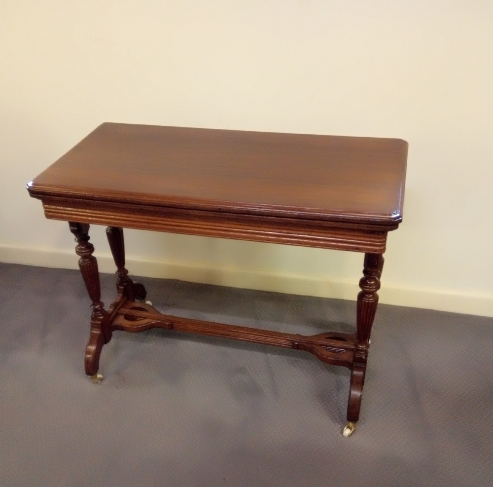 A good clean walnut stretcher table games table. View II