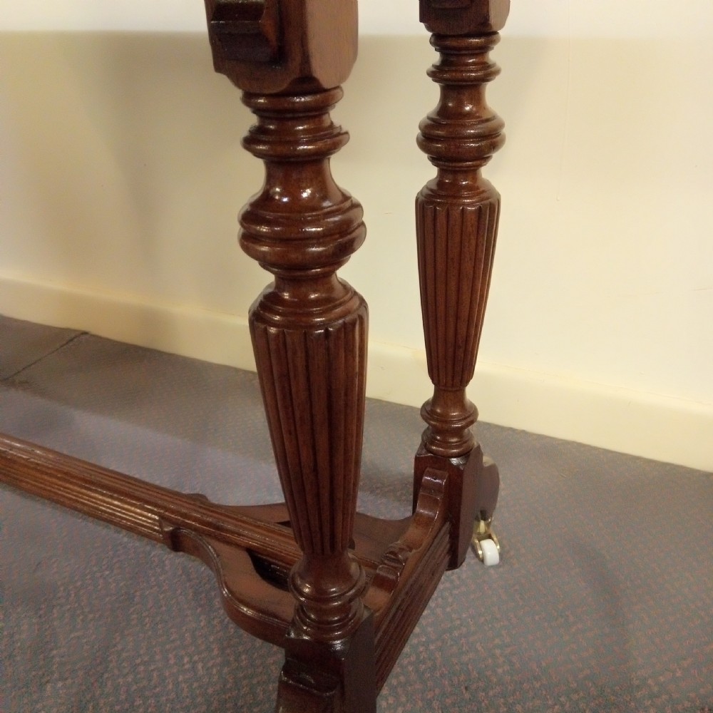 A good clean walnut stretcher table games table. View III