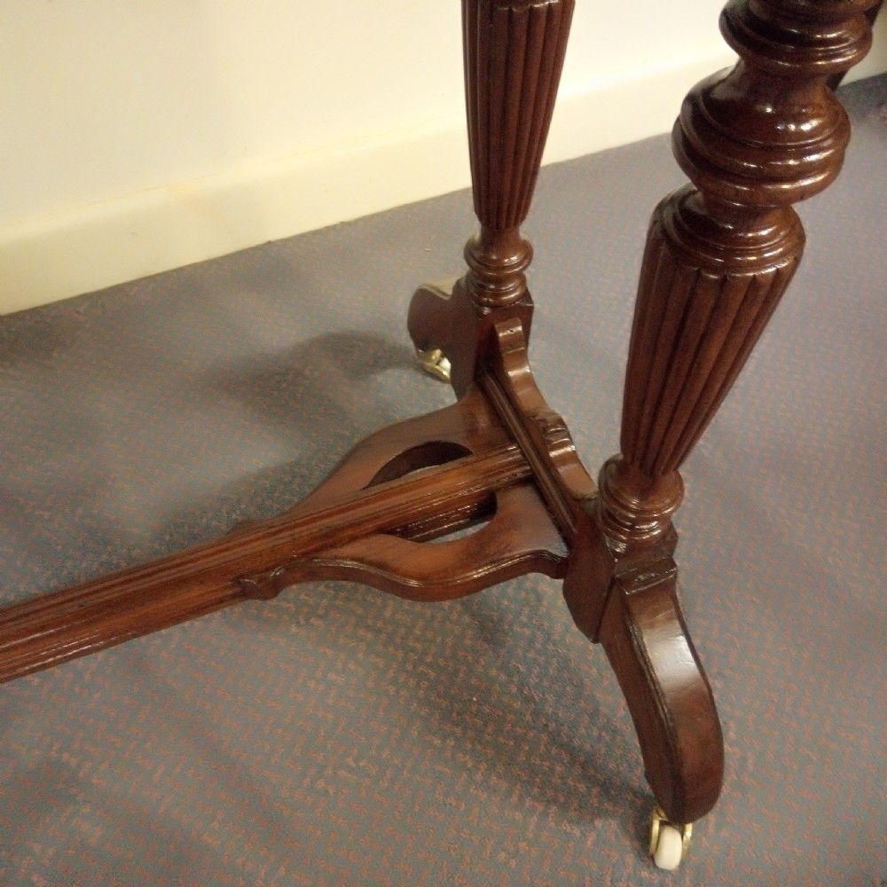 A good clean walnut stretcher table games table. View IV