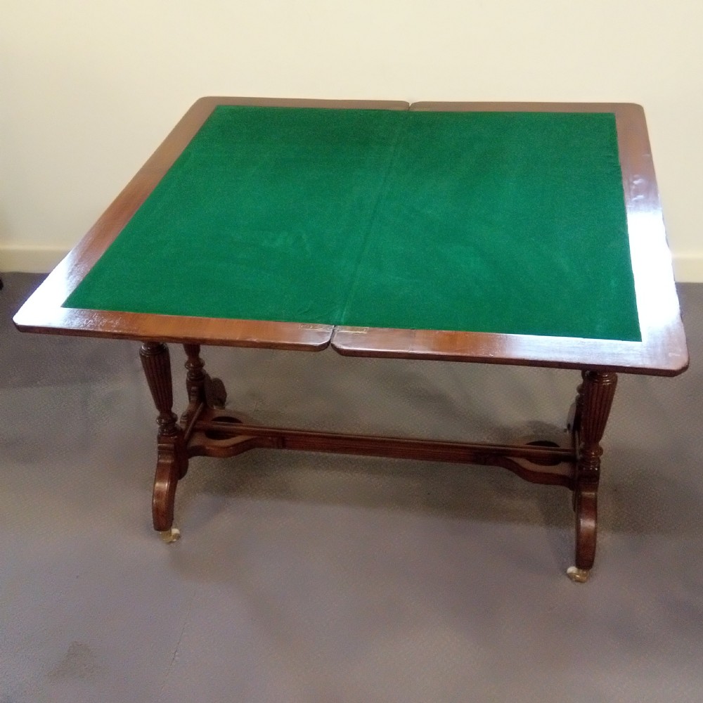 A good clean walnut stretcher table games table. View VII