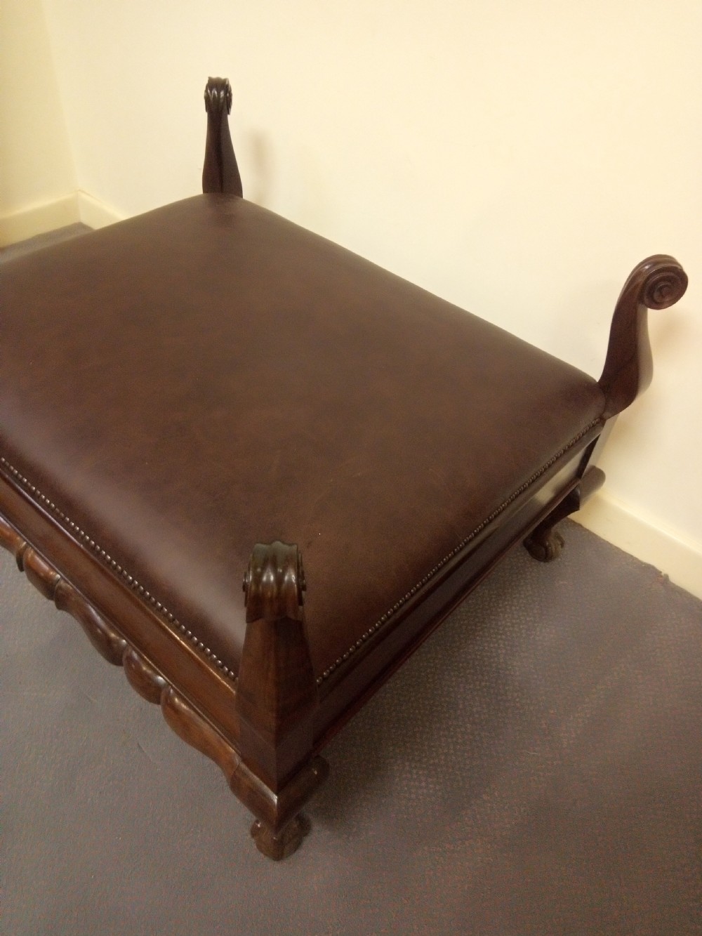 Impressive leather and mahogany stool in most unusual design.  View V
