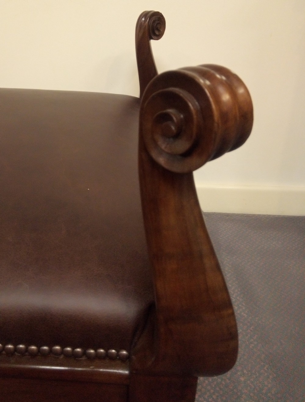 Impressive leather and mahogany stool in most unusual design.  View VI
