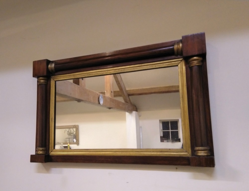 19th Century Rosewood Overmantle mirror with parcel gilt.
