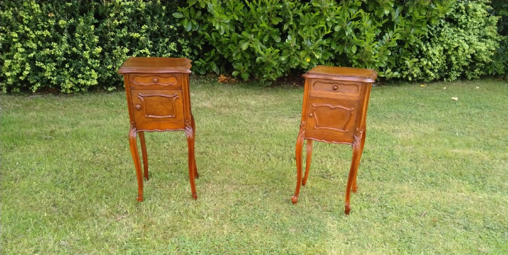 A near pair of walnut bedside cabinets. French View II