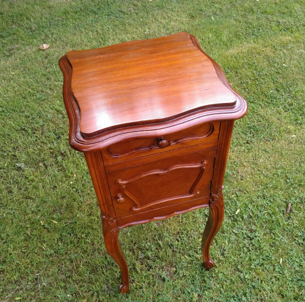 A near pair of walnut bedside cabinets. French View III