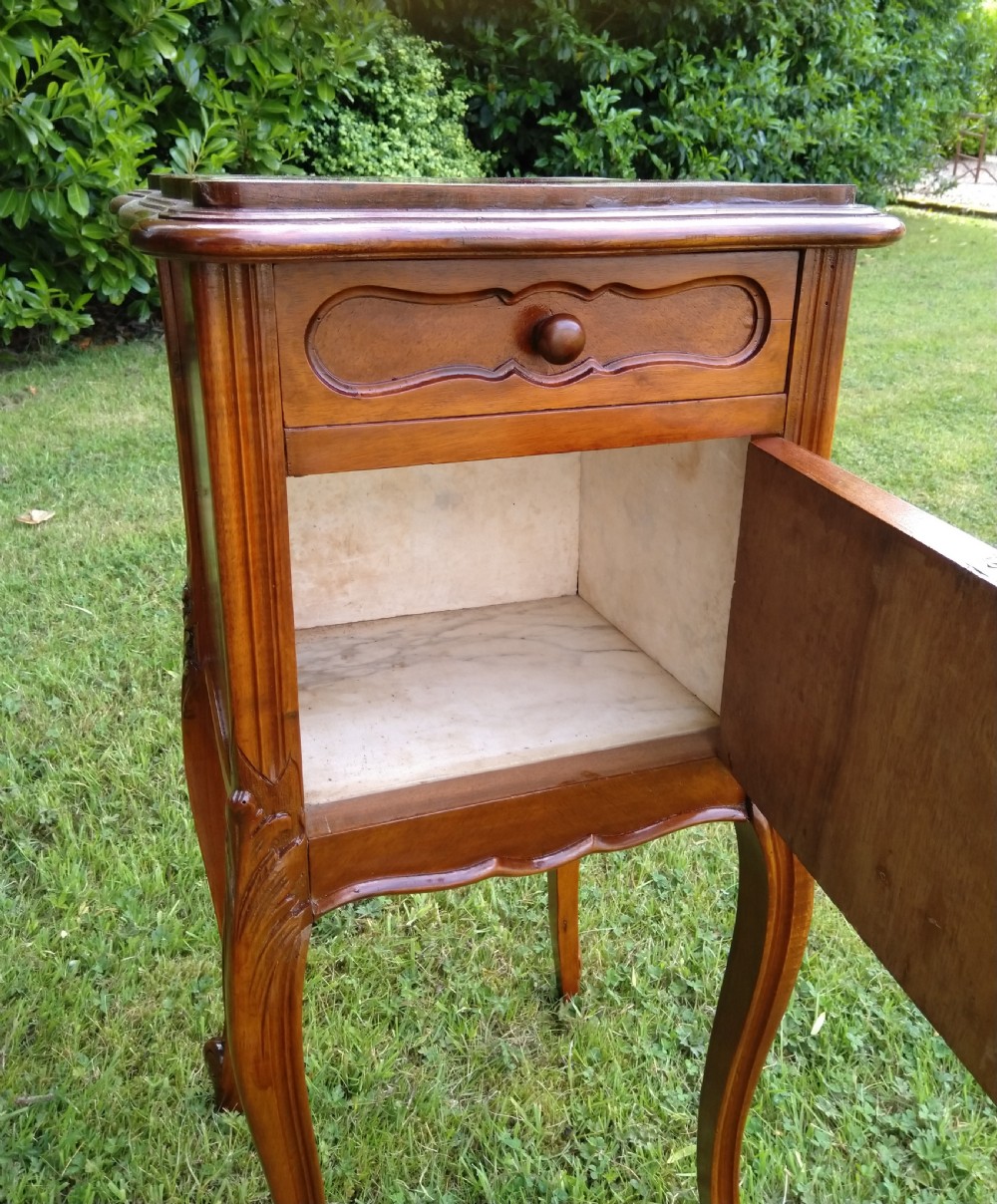 A near pair of walnut bedside cabinets. French View VII
