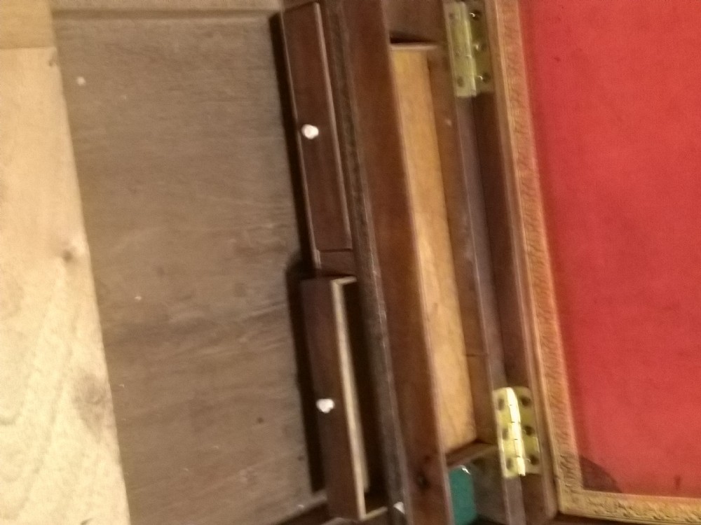 A rectangular dark mahogany wood writing slope featuring polished brass corner mounts, an escutcheon, and a brass central cartouche. View VIII