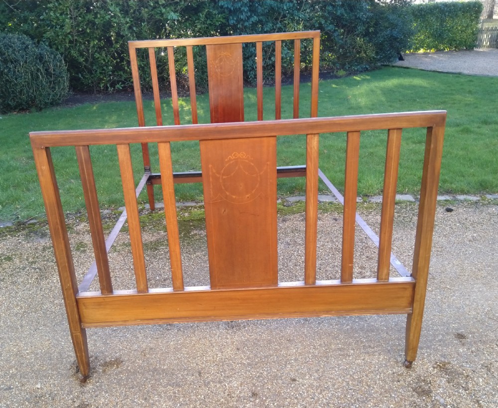 Inlaid Mahogany double bed with side irons unrestored to clear